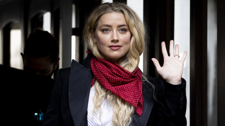 Amber Heard waving