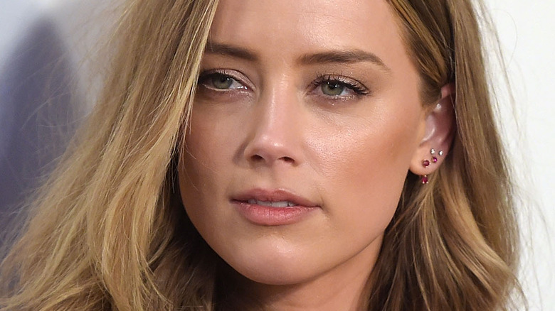 Amber Heard looking to the side