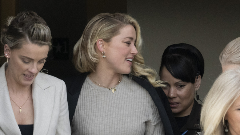 Whitney Henriquez and Amber Heard at an event