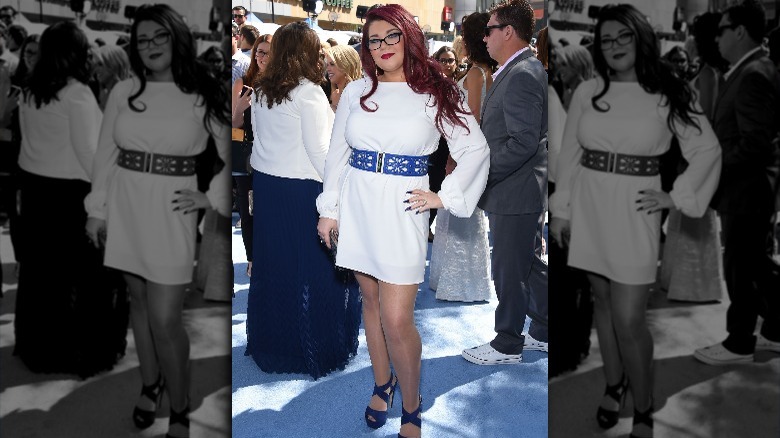 Amber Portwood with hand on her hip at an event