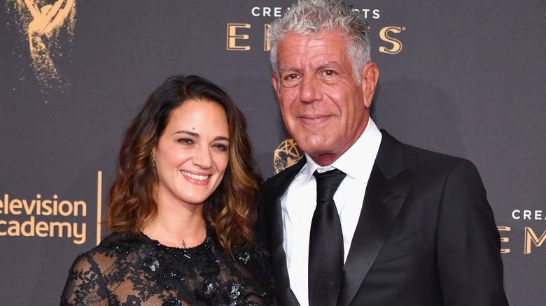 Asia Argento, Anthony Bourdain smiling