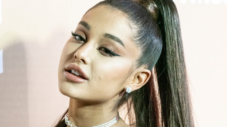 Ariana Grande poses on the red carpet