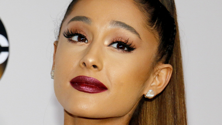Ariana Grande poses on the red carpet