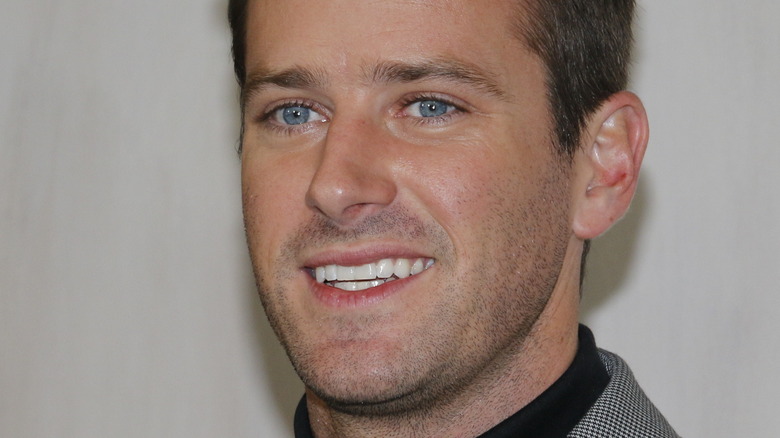 Armie Hammer smiles