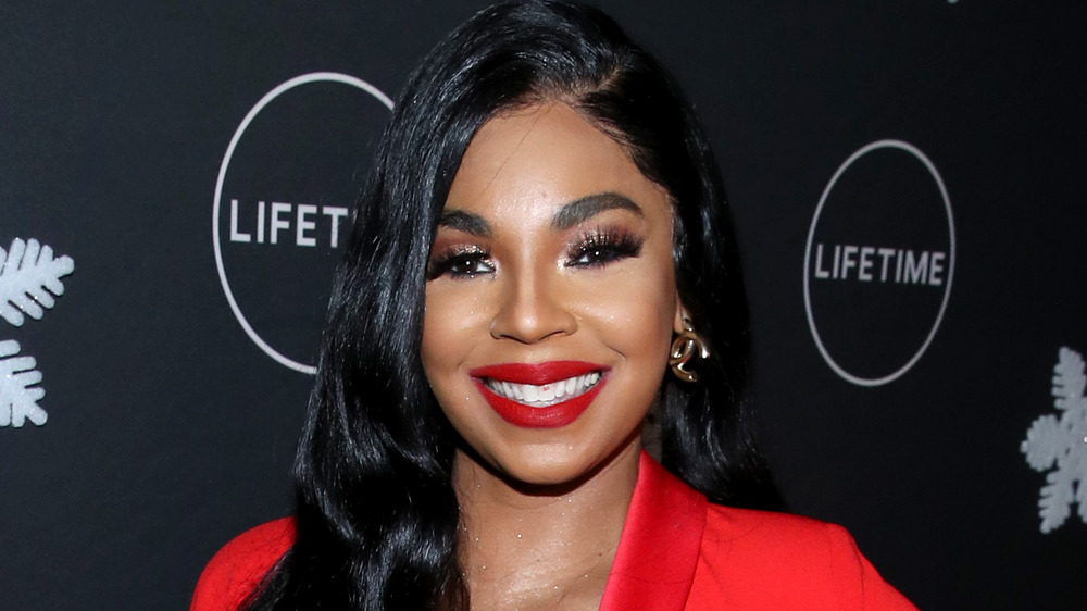 Ashanti wears a bold lip