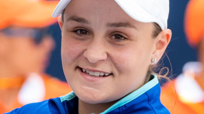 Ashleigh Barty smiles with her trophy
