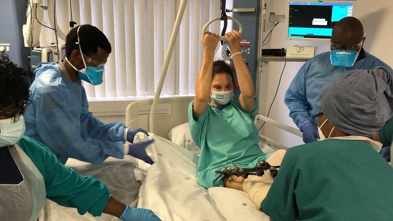 Ashley Judd at the hospital surrounded by medical staff