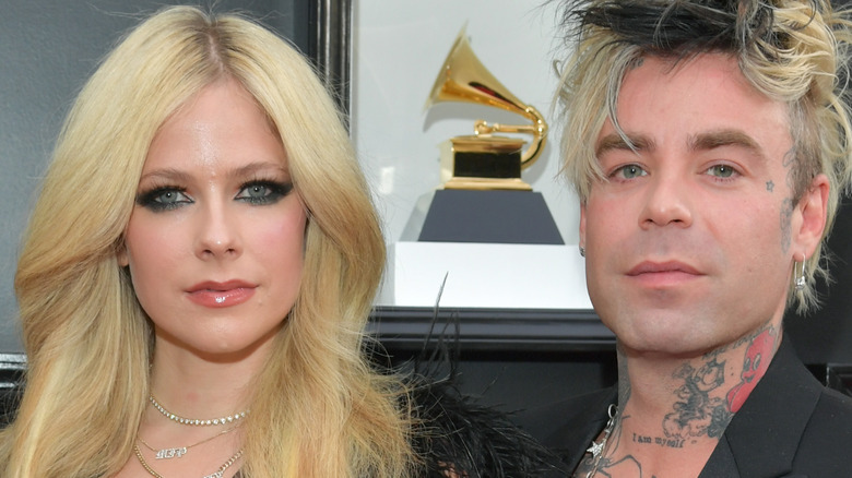 Avril Lavigne with Mod Sun on the red carpet
