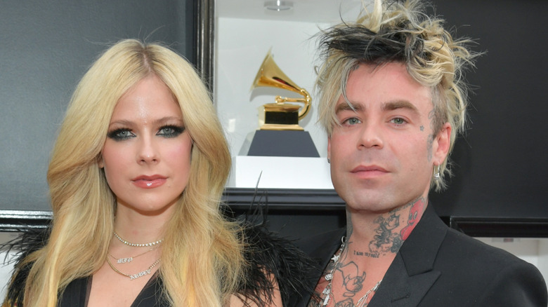 Avril Lavigne with Mod Sun on the red carpet
