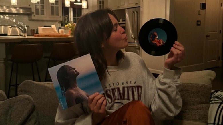 Bailee Madison posing with her single