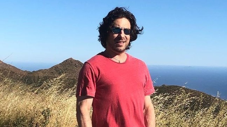Jason Gould posing for cameras