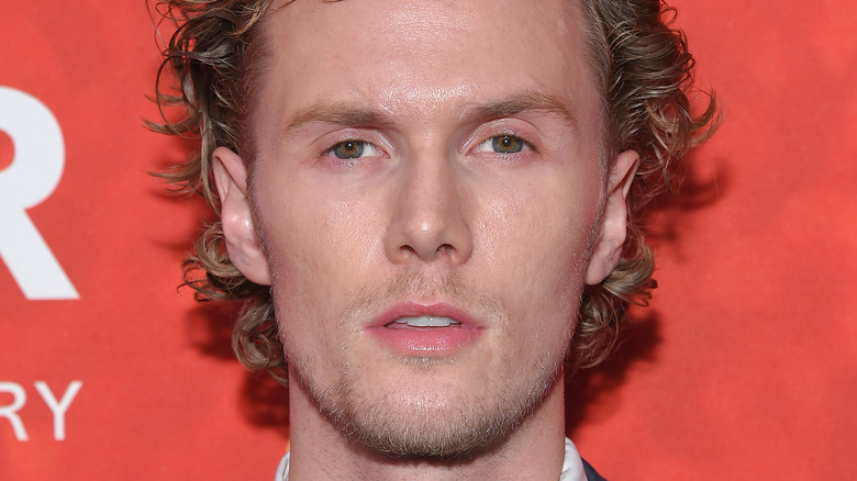 Barron Hilton looks at camera