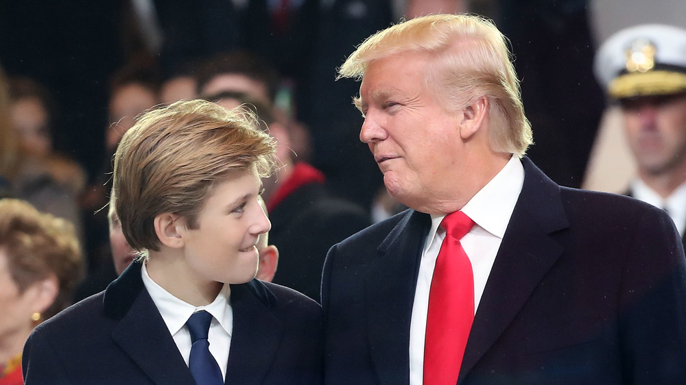 Barron Trump and Donald Trump sharing a look