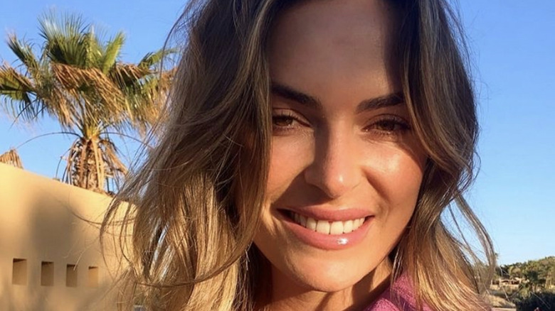 Katie Flood, selfie, smiling, brown hair down, 2021 photo in Mexico