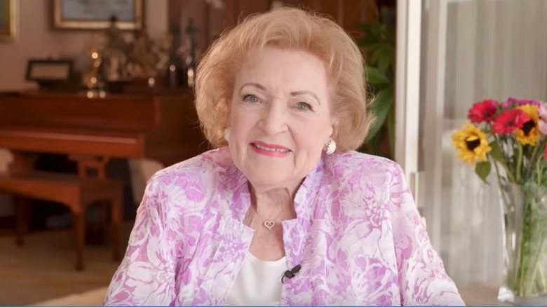 Betty White smiles in a confessional for her birthday bash