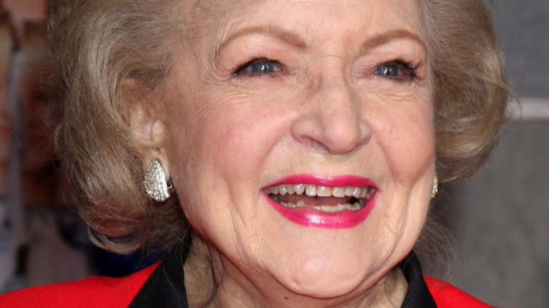 Betty White smiles at an event