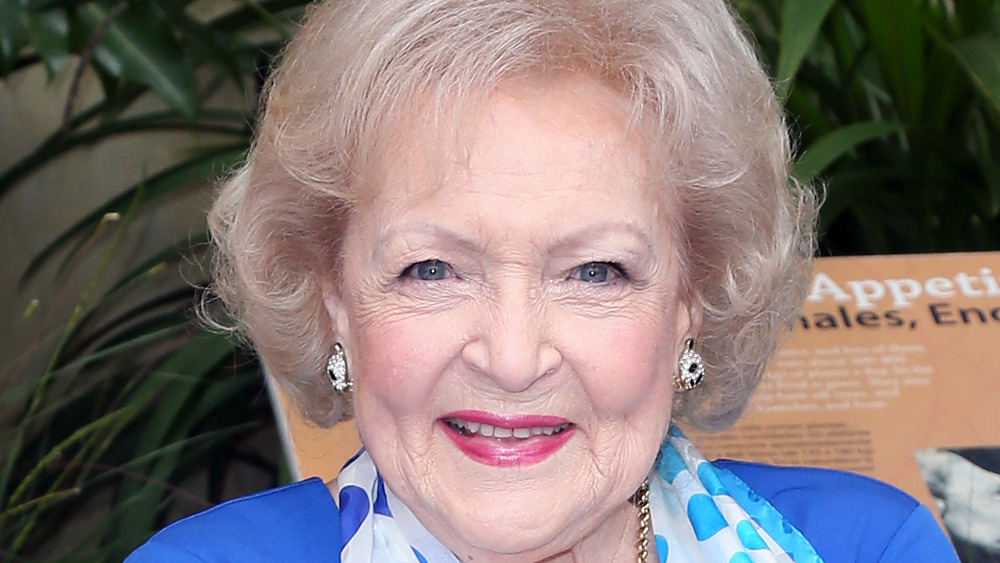 Betty White poses at an event