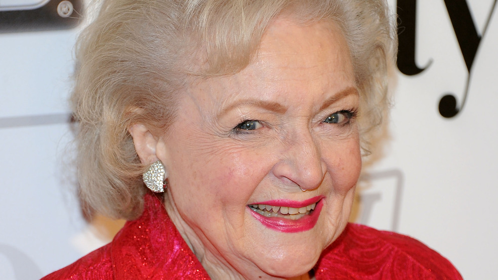Betty White poses at an event