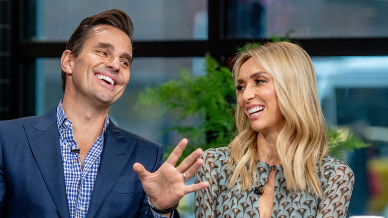 Bill and Giuliana Rancic laughing 