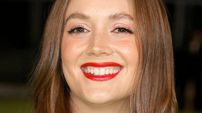 Billie Lourd smiling at a gala