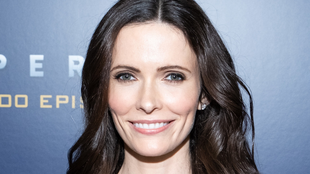 Bitsie Tulloch smiling on the red carpet