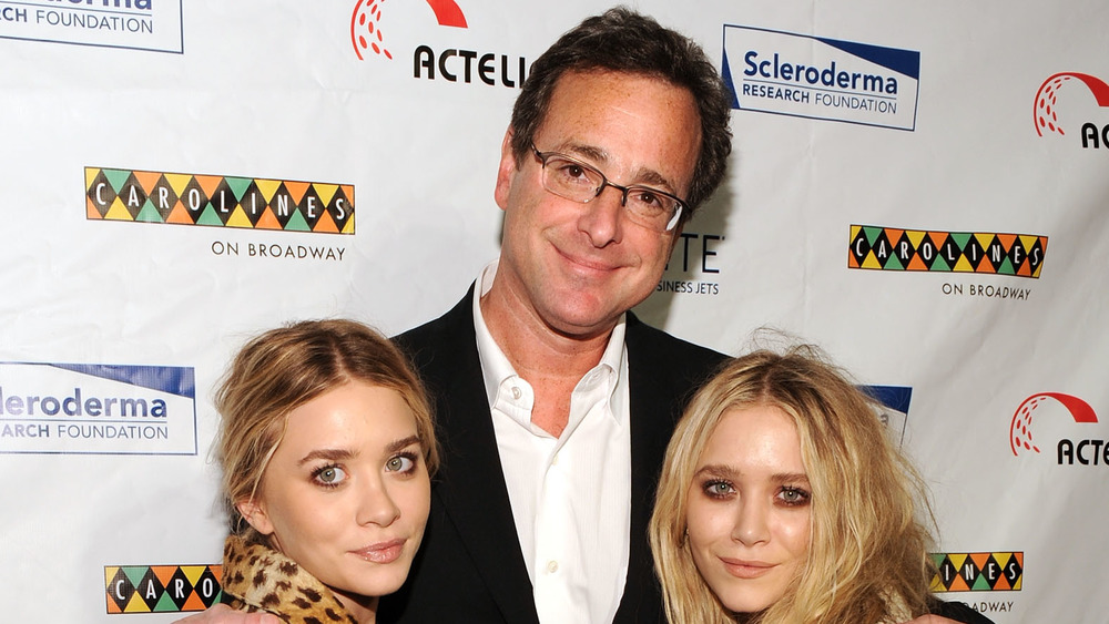 Bob Saget, Ashley Olsen and Mary-Kate Olsen hugging