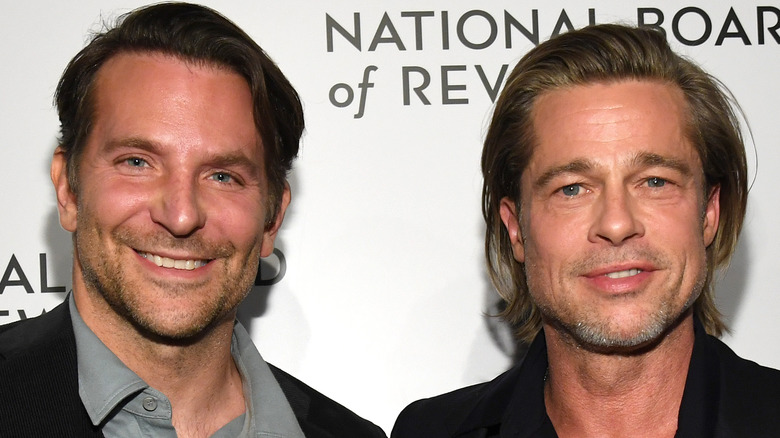 Bradley Cooper and Brad Pitt smiling