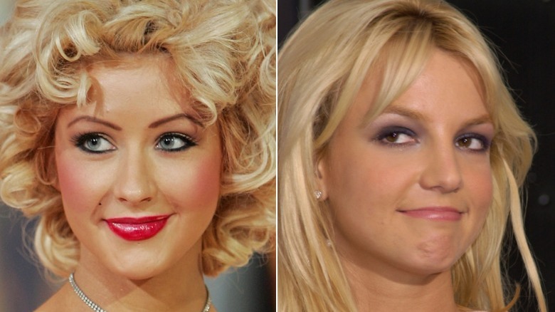 Christina Aguilera smiling, Britney Spears side-eye