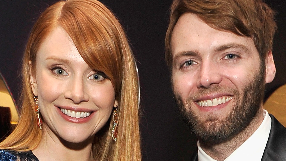 Bryce Dallas Howard and Seth Gabel pose together at an event in 2016