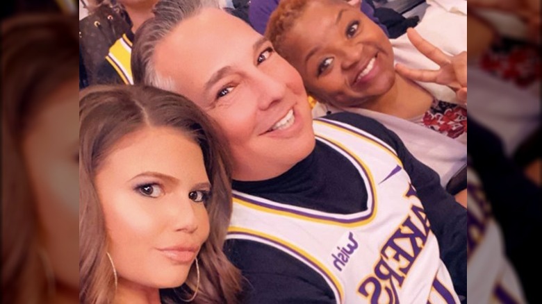 Chanel West Coast taking a selfie with her dad and stepmom