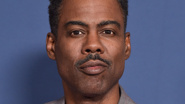 Chris Rock posing