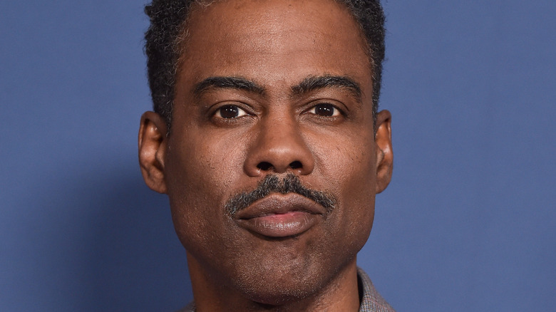 Chris Rock posing