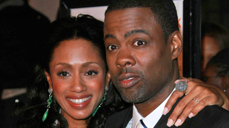 Malaak Compton-Rock and Chris Rock posing