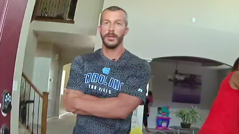 Chris Watts standing with arms crossed