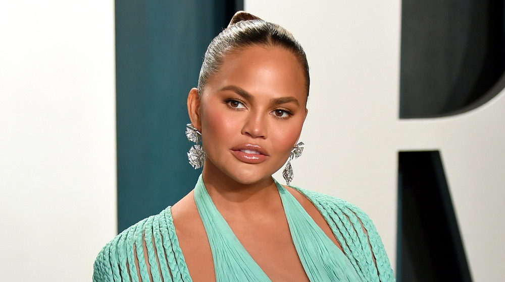 Chrissy Teigen posing on the red carpet