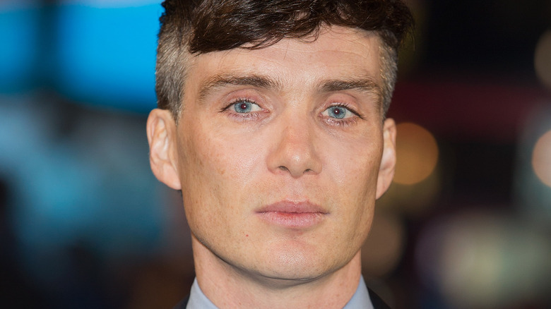 Cillian Murphy with serious expression at a premiere