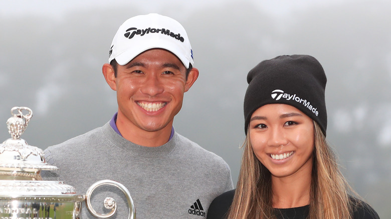 Collin Morikawa and Katherine Zhu with trophy