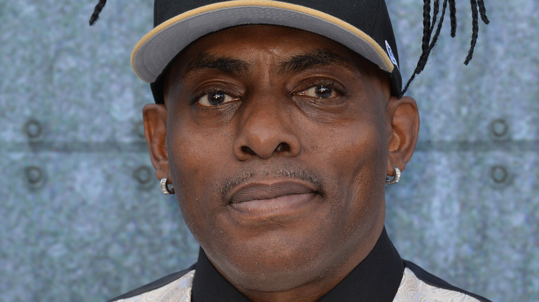 Coolio wearing a hat