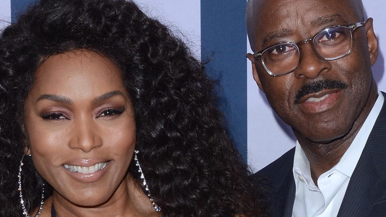 Angela Bassett and Courtney B. Vance posing together