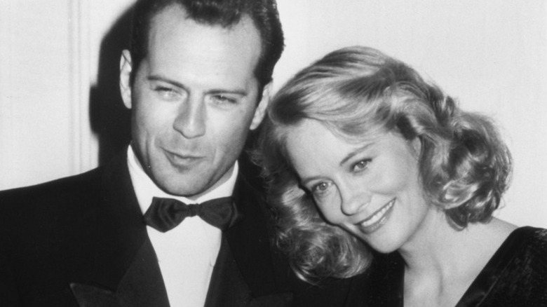 Bruce Willis and Cybill Shepherd posing