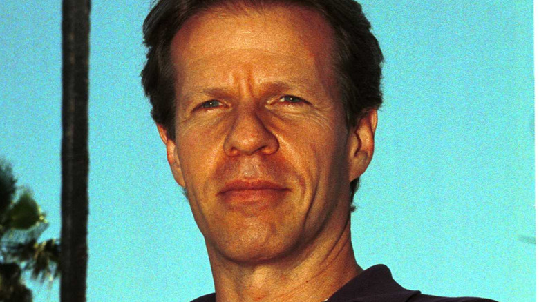 Robert Martin in front of palm trees