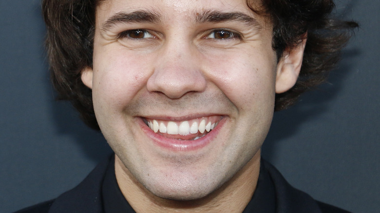 David Dobrik smiling on red carpet 