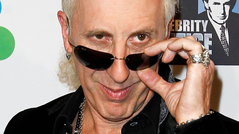 Dee Snider posing at a red carpet event