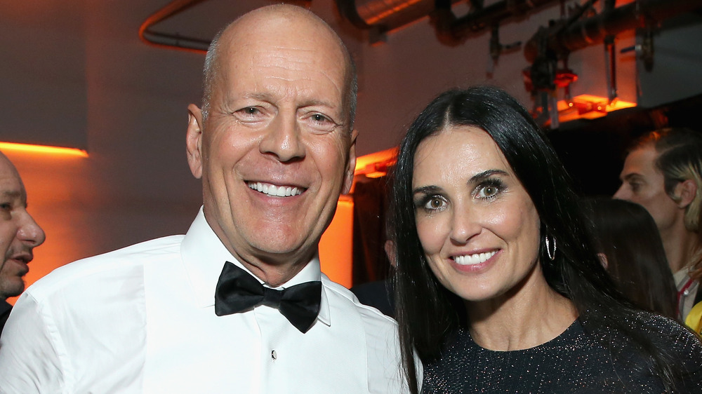 Bruce Willis and Demi Moore smiling