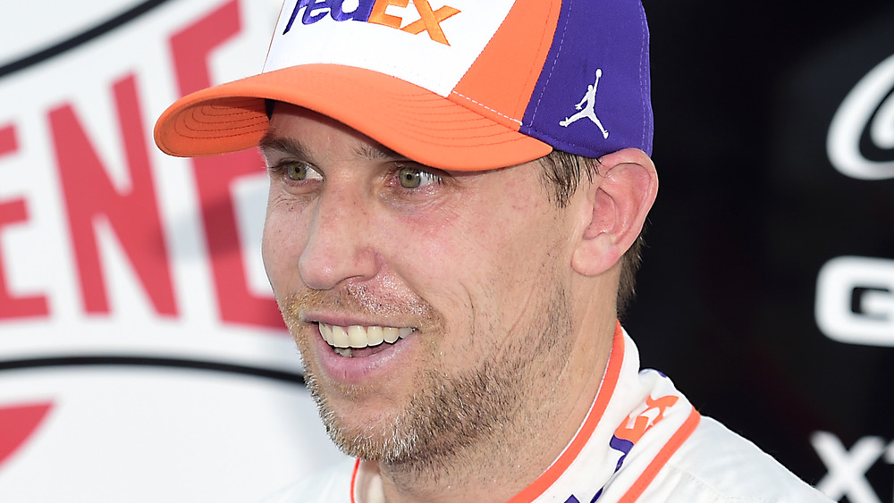 Denny Hamlin speaking to reporters after a race