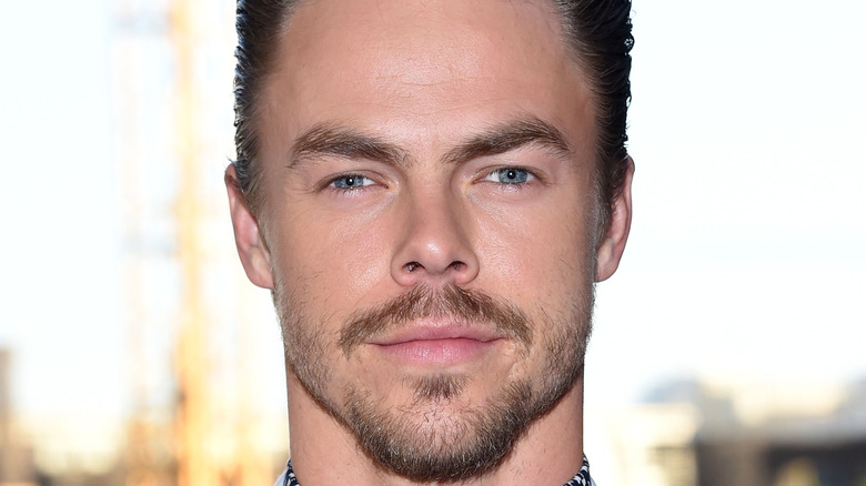 Derek Hough with a neutral expression