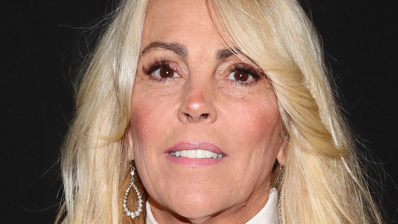 Dina Lohan posing backstage for the Vivienne Hu show during New York Fashion Week: The Shows 
