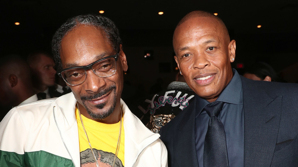 Snoop Dogg and Dr. Dre smiling together