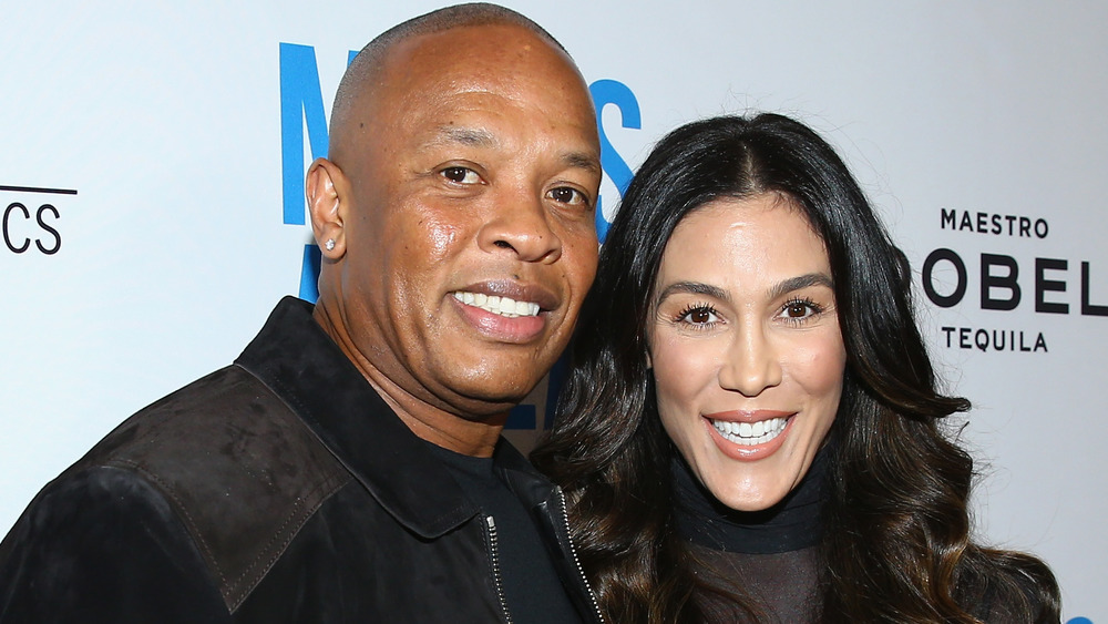 Dr. Dre and Nicole Young smiling