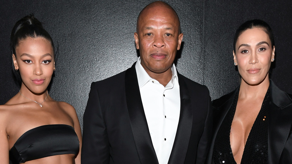 Truly Young, Dr. Dre, and Nicole Young posing together